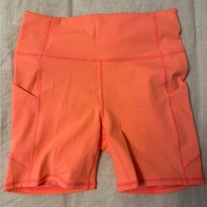 Fabletics Bright Orange Bike Shorts